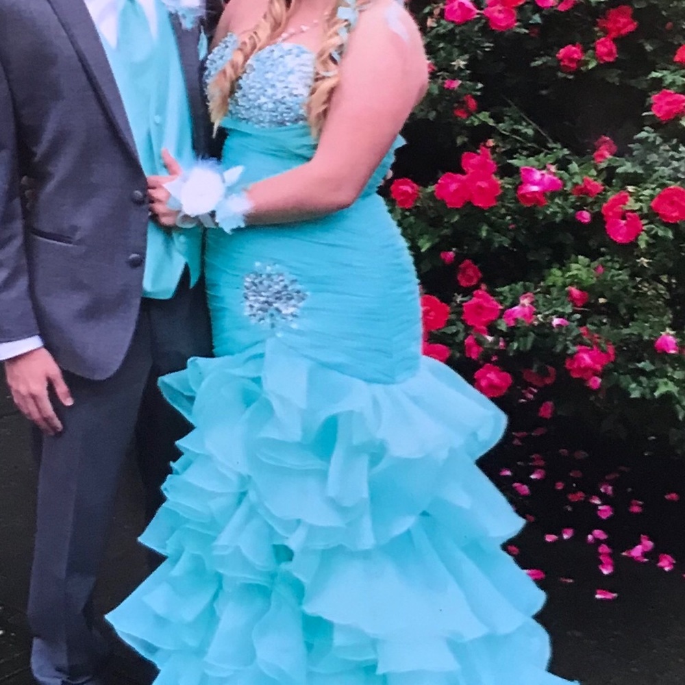 Mint green organza prom dress.